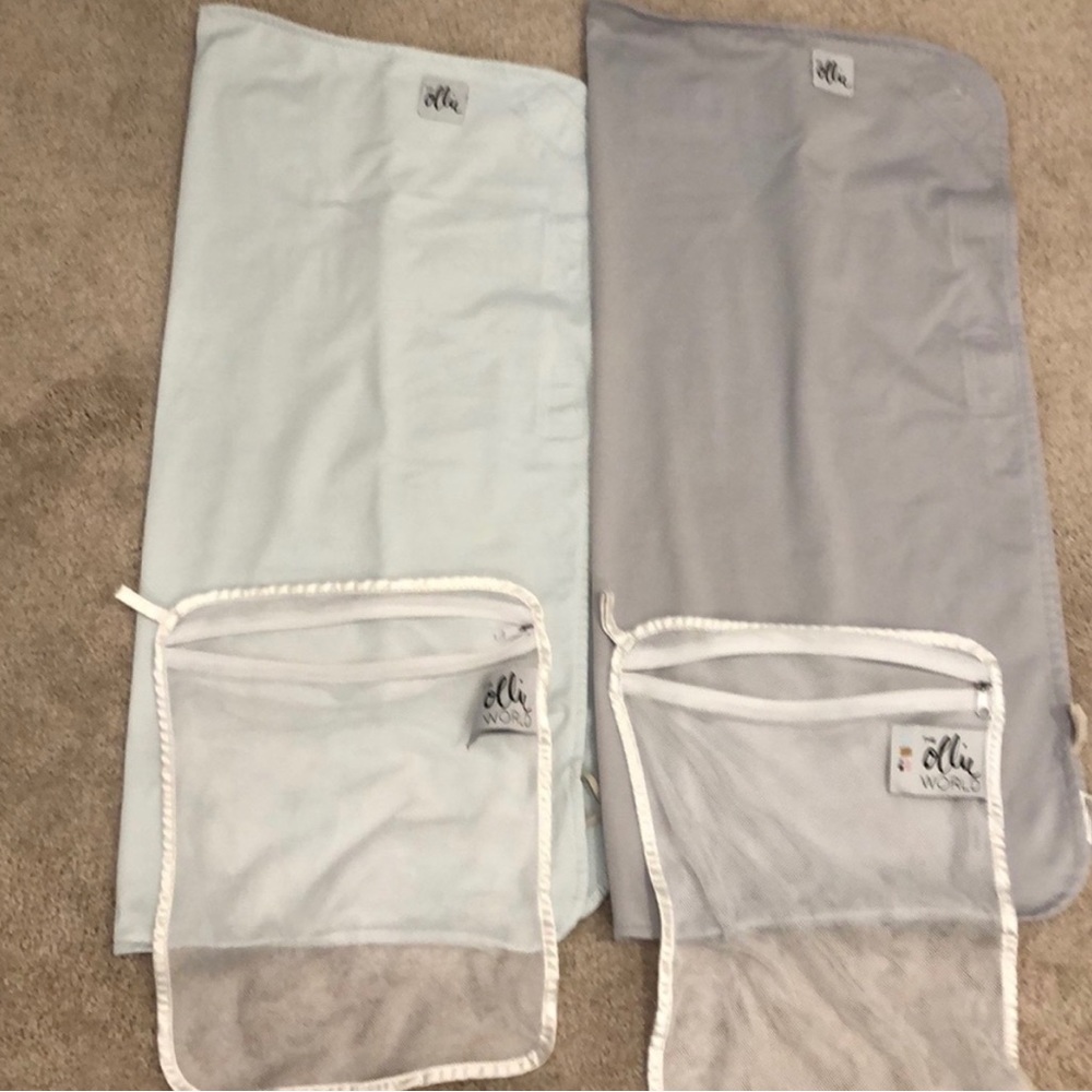 Ollie swaddles stone and sky gently used